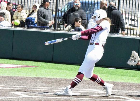 Littlefield sophomore, Lyric Rios blasts a double to left field, during the Lady Cats, 11-6, victory last Saturday over Lamesa at Lady Cat Field. (Staff Photo by Derek Lopez)