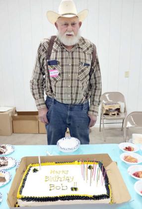 Bob Edwards is pictured with his birthday cake at his annual Fish Fry Charity event on Saturday April 20, 2024. The Edwards family accepts cash and non-perishable food items to benefit the New Mexico Christian Children’s Home in Portales, NM. (Photo by Ann Reagan)