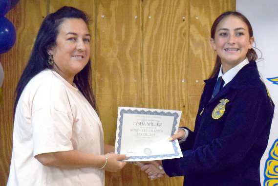 TYSHA MILLER received her Honorary FFA Chapter Degree from Teagan Miller at the 2023 FFA Banquet held on May 2, 2023. (Photo by Ann Reagan)