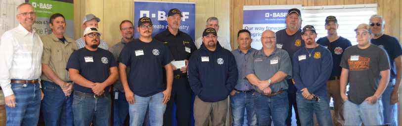 City officials and members of the Littlefield volunteer fire department gathered at the BASF Plant in Littlefield on Tuesday morning, as the Littlefield Fire Department was presented with a donation to go towards a new fire engine. (Staff Photo by Samantha Pontius)