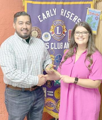 Justin Balderas, Outgoing Lions Club President, presented the gavel to the incoming Club President DeLynn Butler.